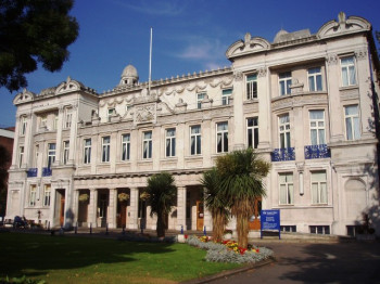 The image is the Queen's Building by Ewan Munro from Wikipedia, uploaded on a Creative Commons Attribution-Share Alike 2.) Generic License./